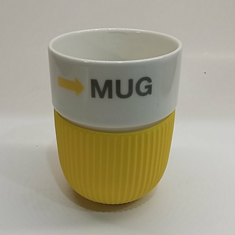 Eco one mug with removable yellow rubber grip